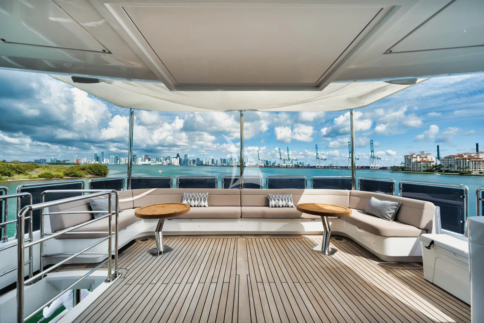 a room with a couch and a table and chairs aboard PERSISTENCE Yacht for Sale
