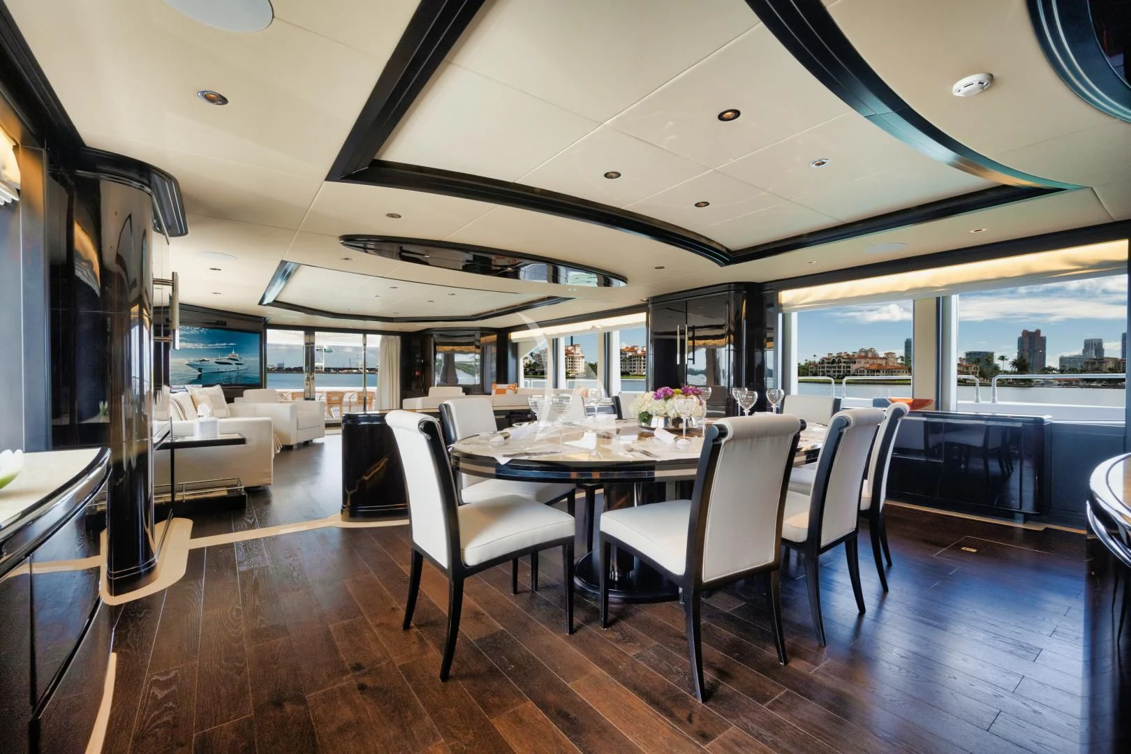 a room with a table and chairs aboard PERSISTENCE Yacht for Sale