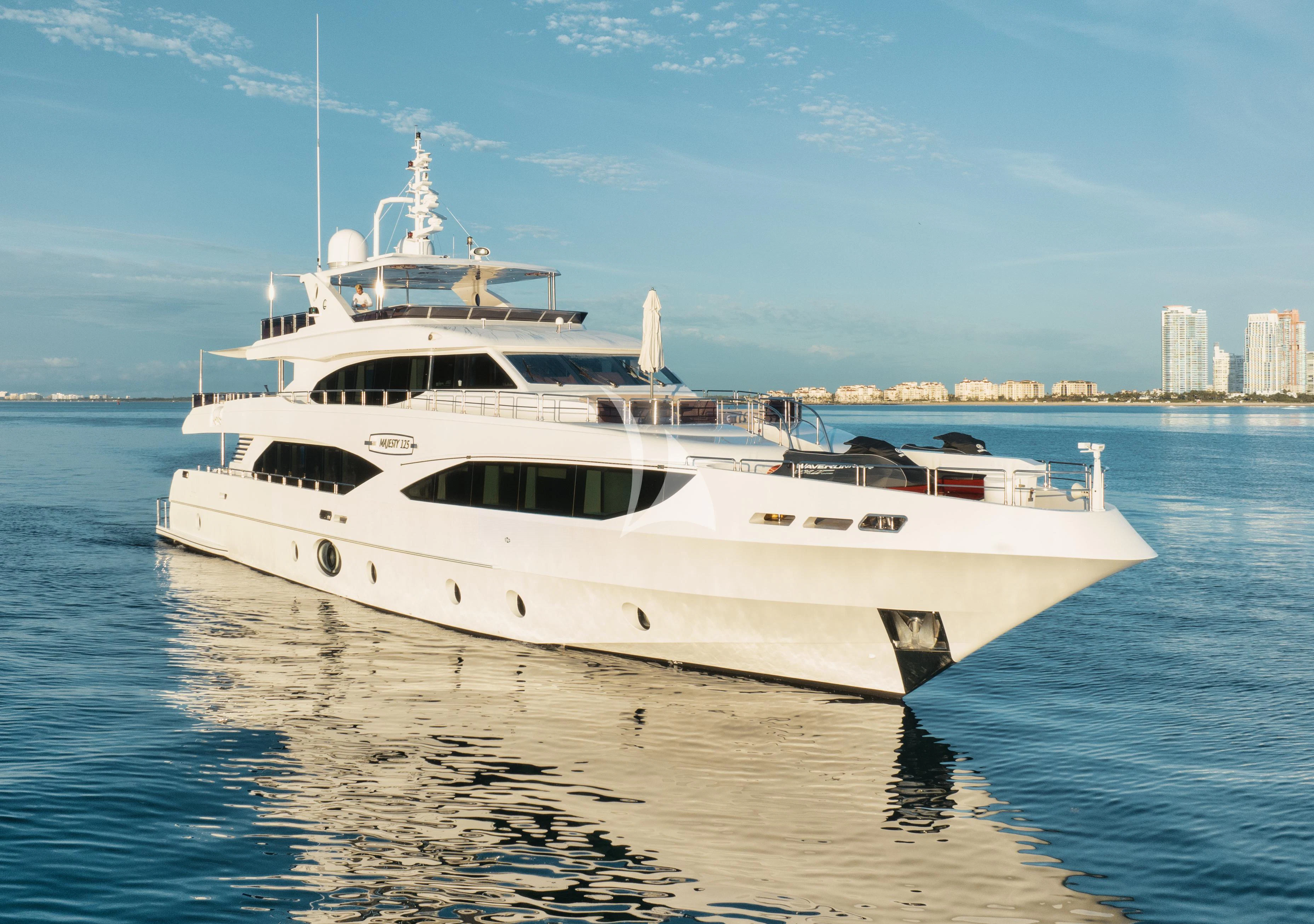 a white yacht in the water aboard PERSISTENCE Yacht for Sale