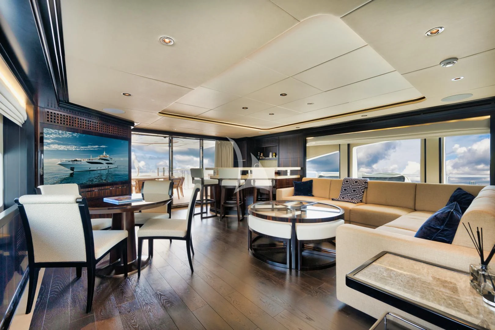 a living room with a large window aboard PERSISTENCE Yacht for Sale