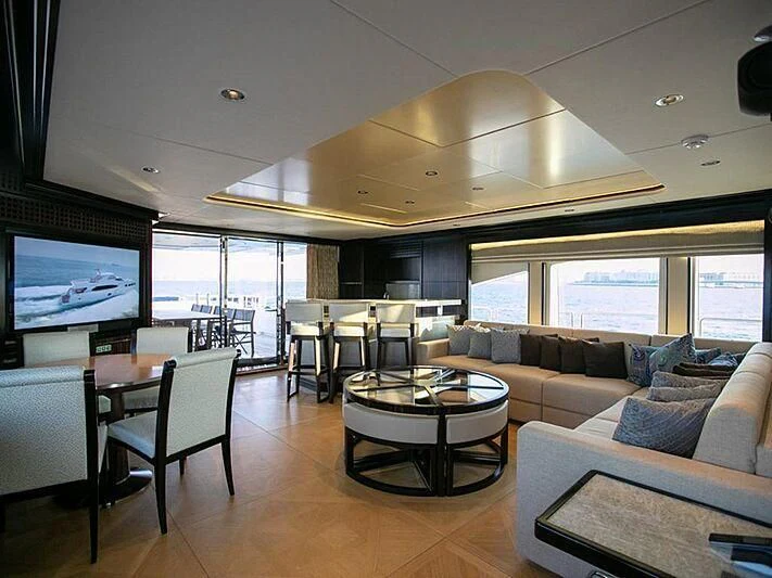 a living room with a large ceiling aboard PERSISTENCE Yacht for Sale