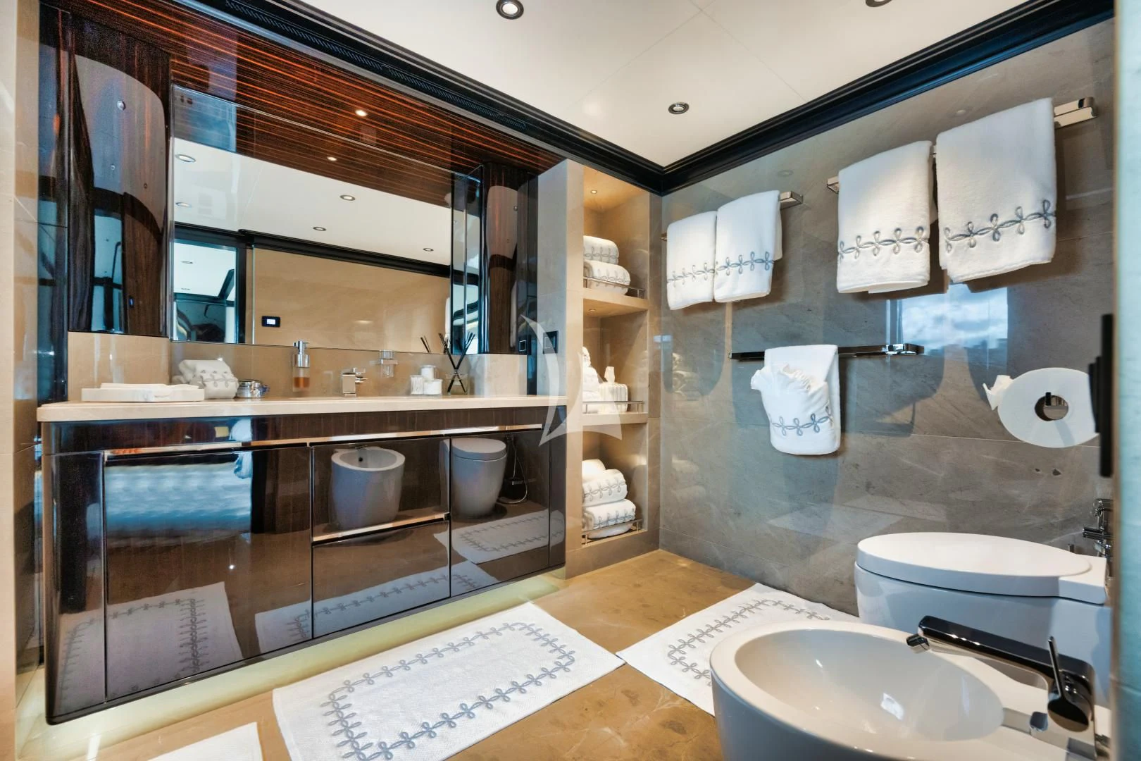 a bathroom with a large mirror aboard PERSISTENCE Yacht for Sale