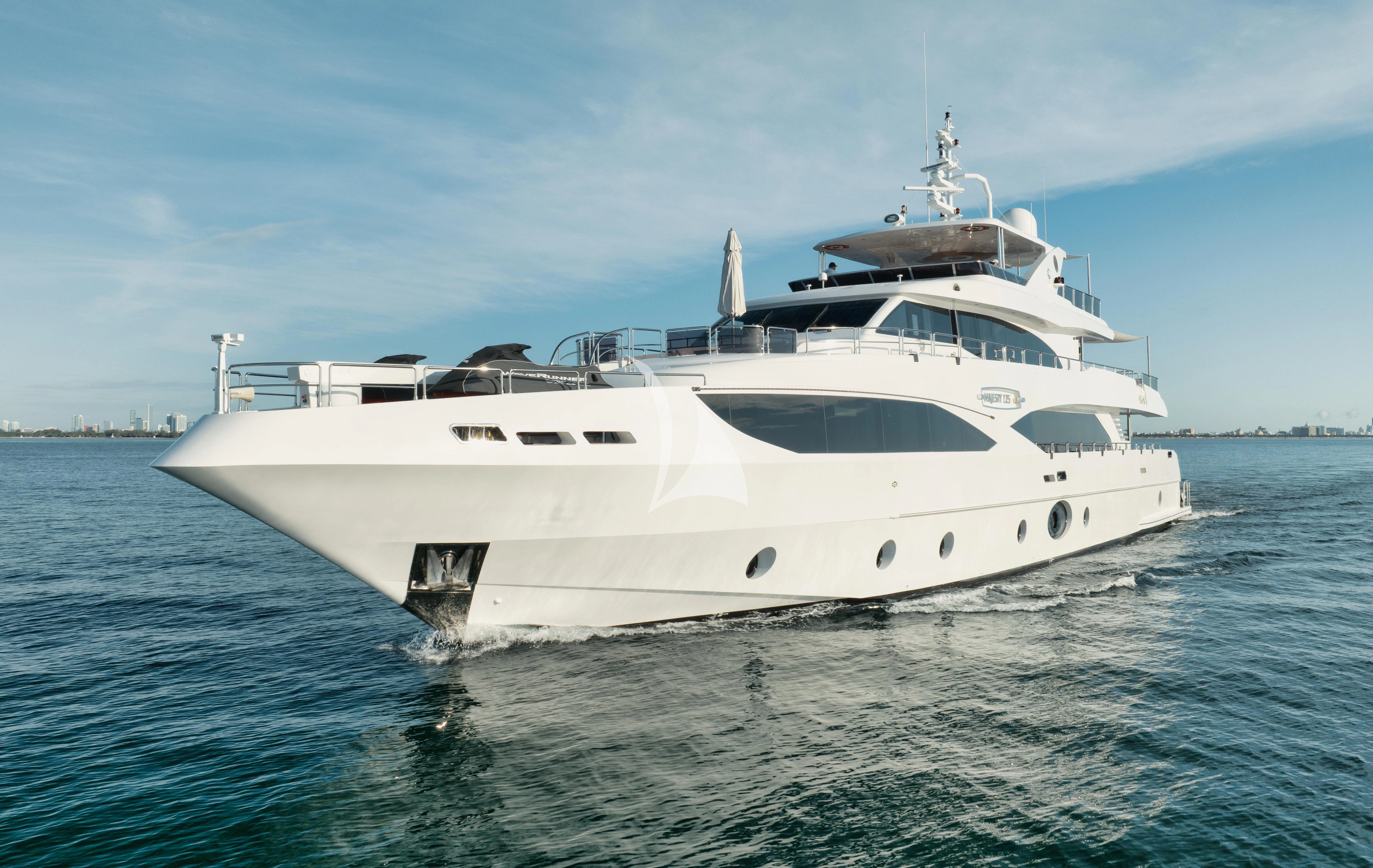 a white yacht in the water aboard PERSISTENCE Yacht for Sale