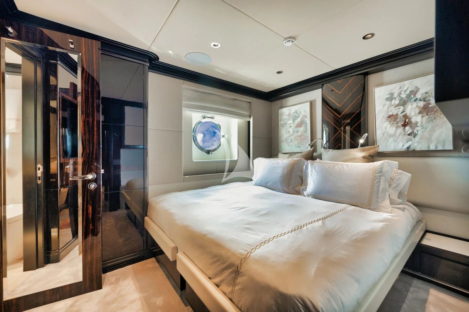a bed in a room aboard PERSISTENCE Yacht for Sale