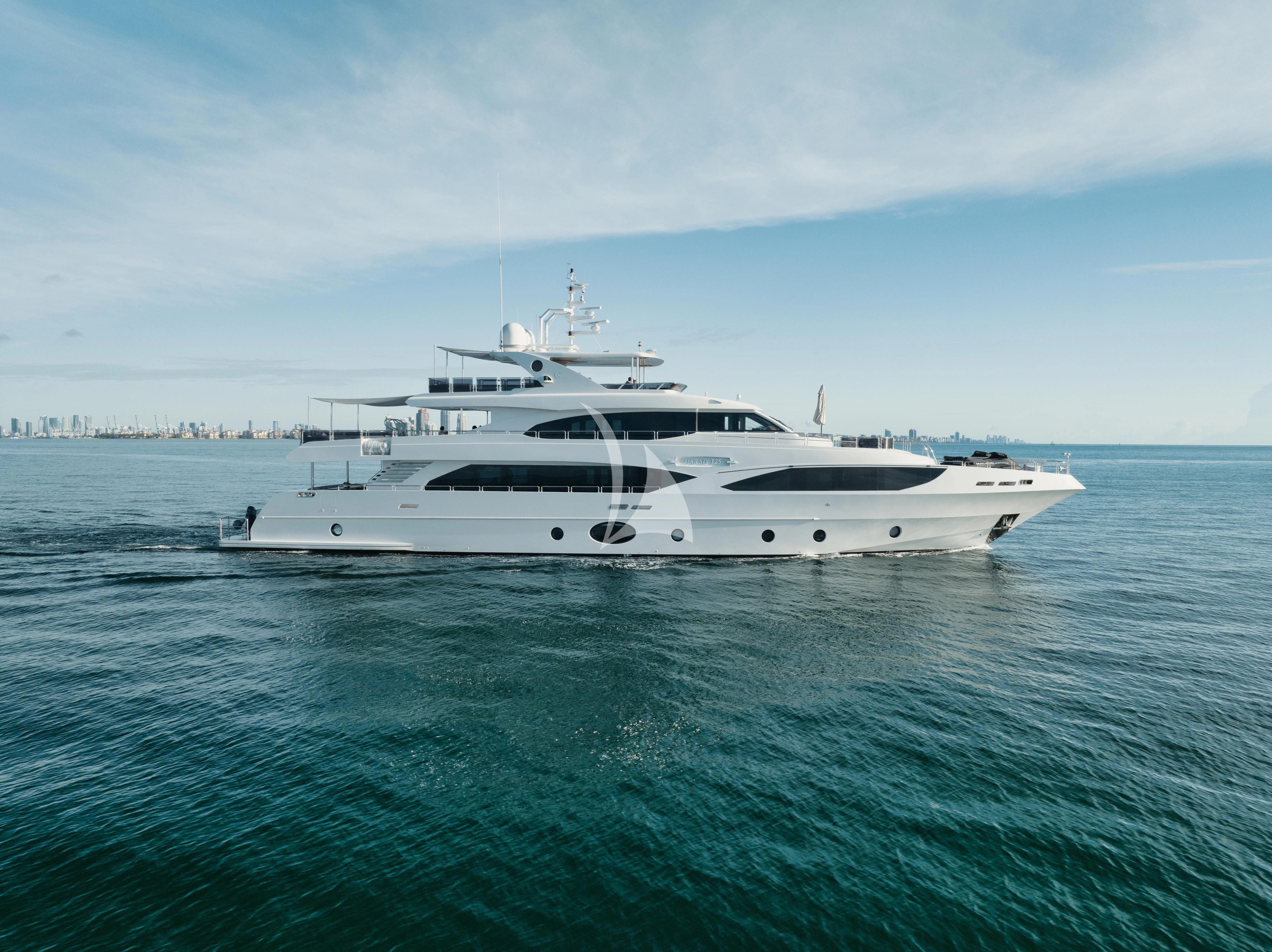 a white yacht in the water aboard PERSISTENCE Yacht for Sale