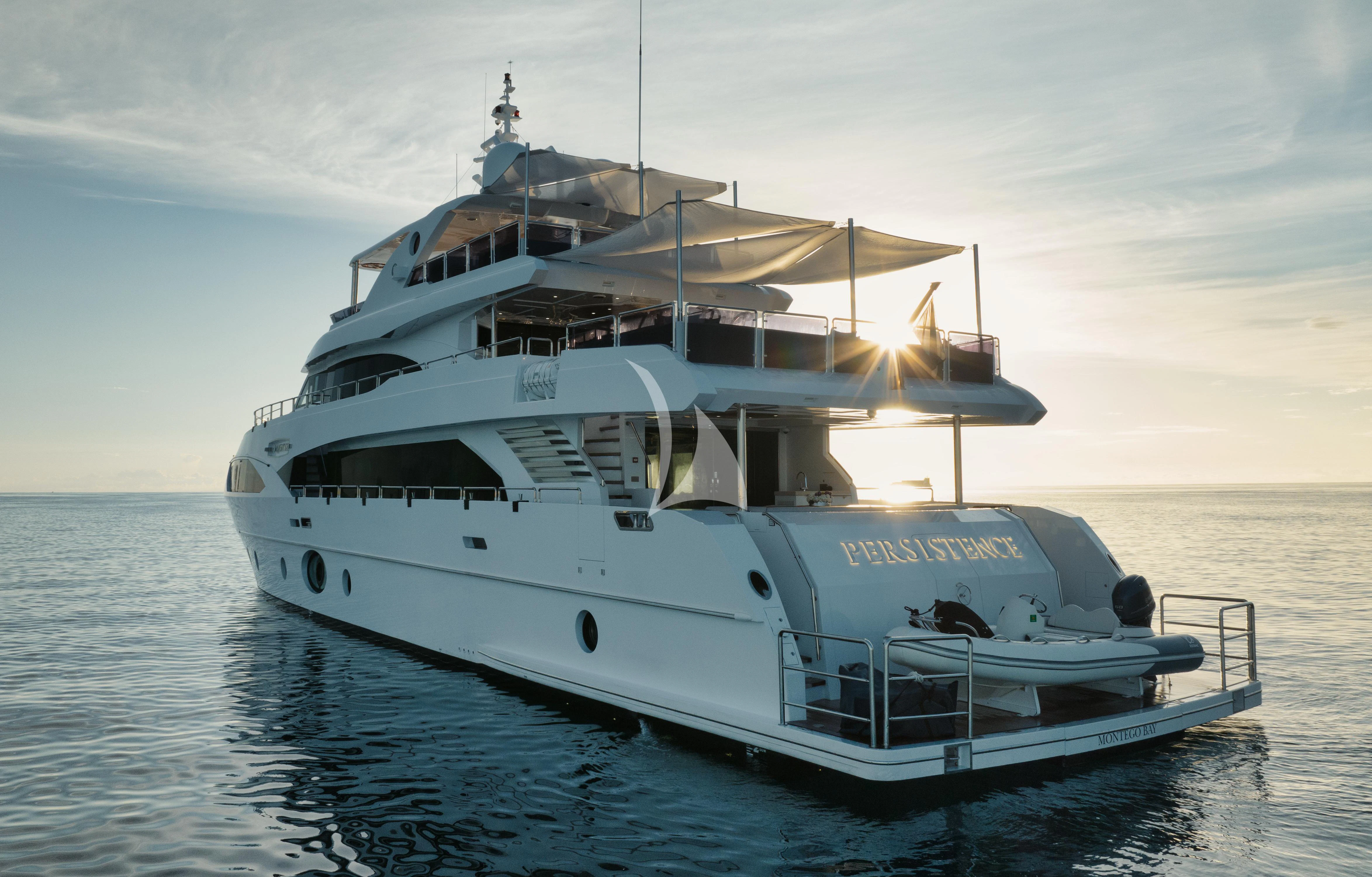 a large white boat in the water aboard PERSISTENCE Yacht for Sale