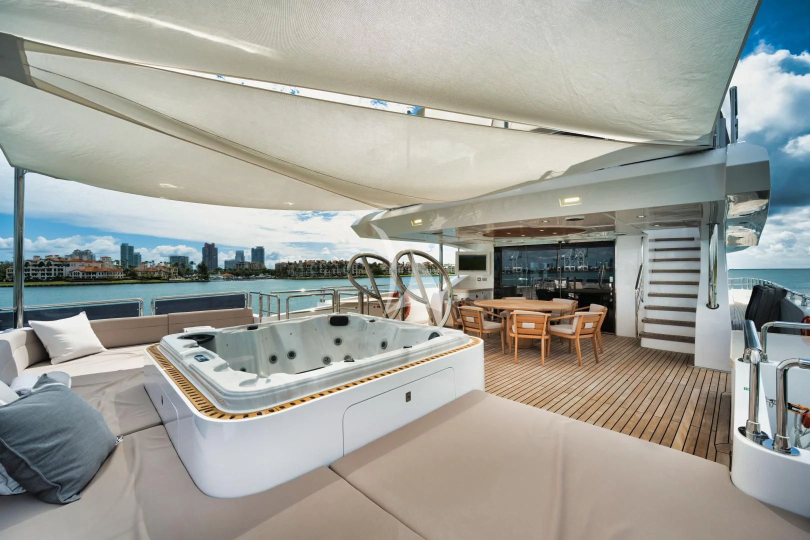 a large white bed in a room aboard PERSISTENCE Yacht for Sale