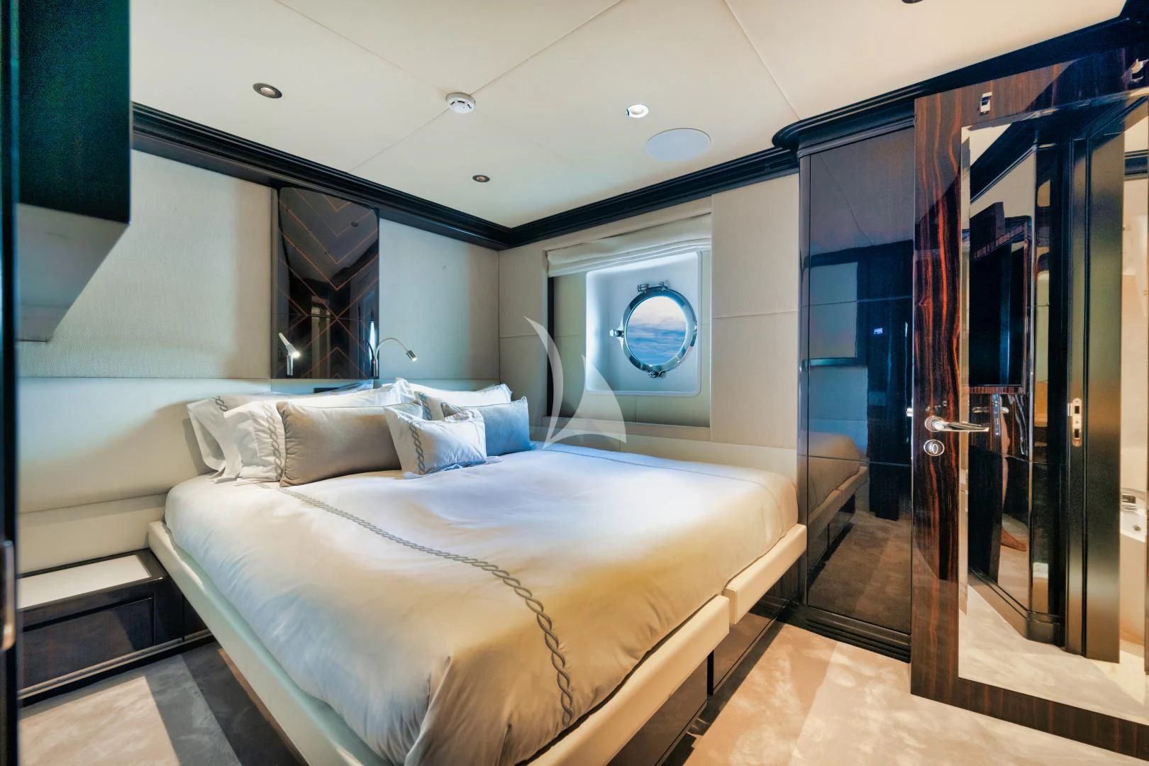 a bed in a room aboard PERSISTENCE Yacht for Sale