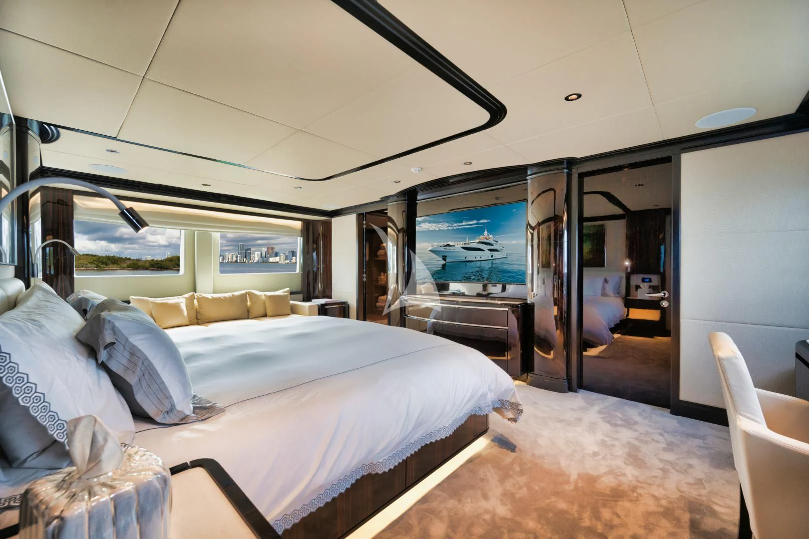 a bedroom with a large bed aboard PERSISTENCE Yacht for Sale