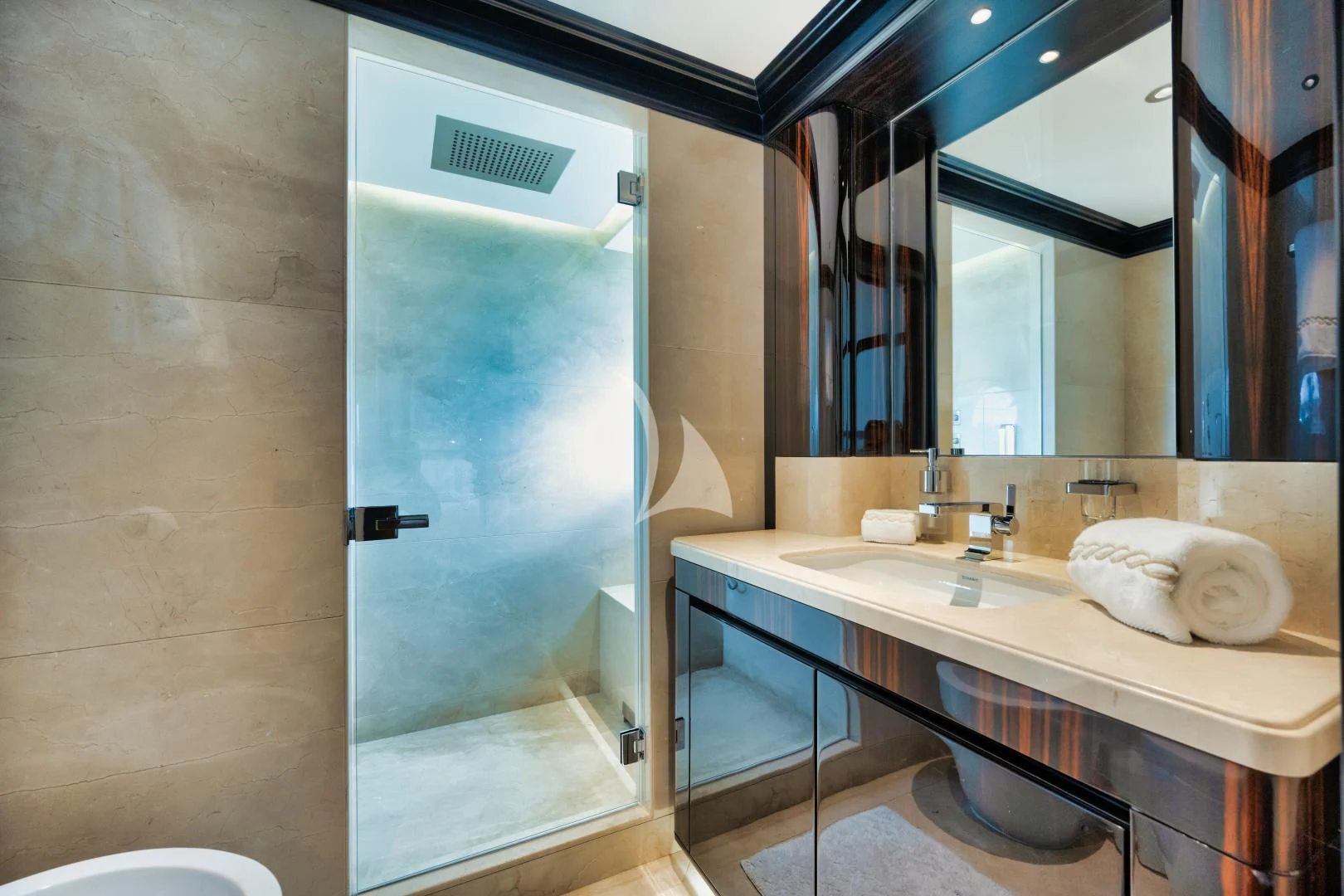 a bathroom with a sink and a mirror aboard PERSISTENCE Yacht for Sale