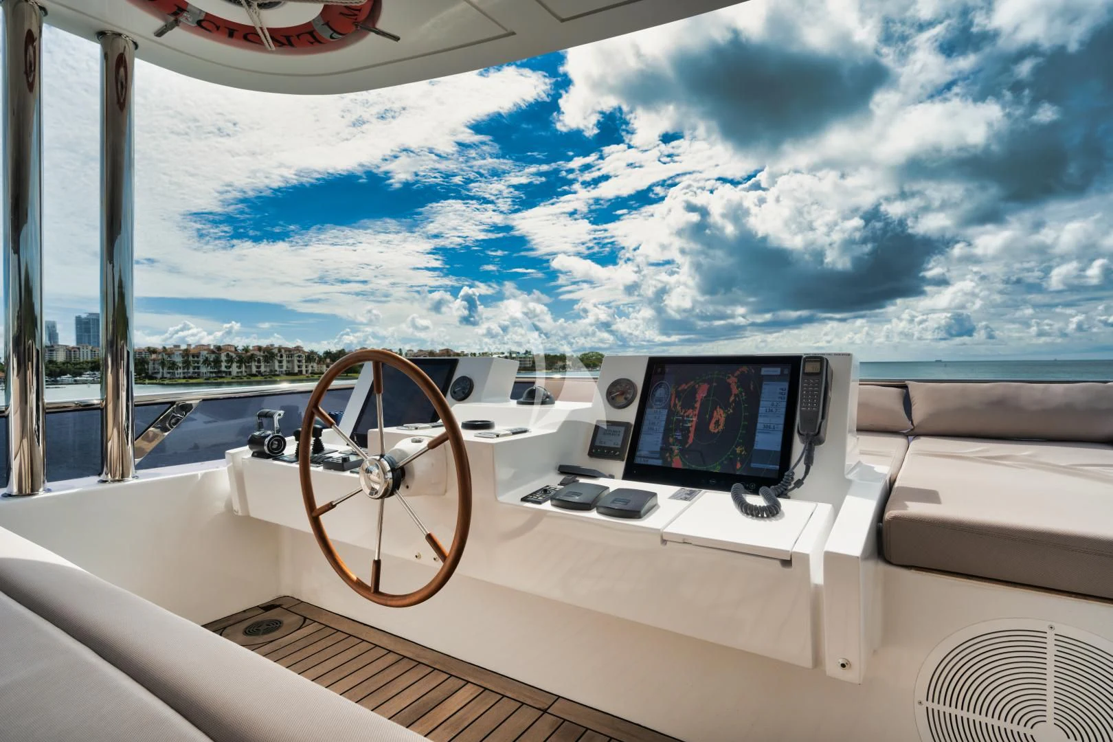 a view of a city from the cockpit of a plane aboard PERSISTENCE Yacht for Sale