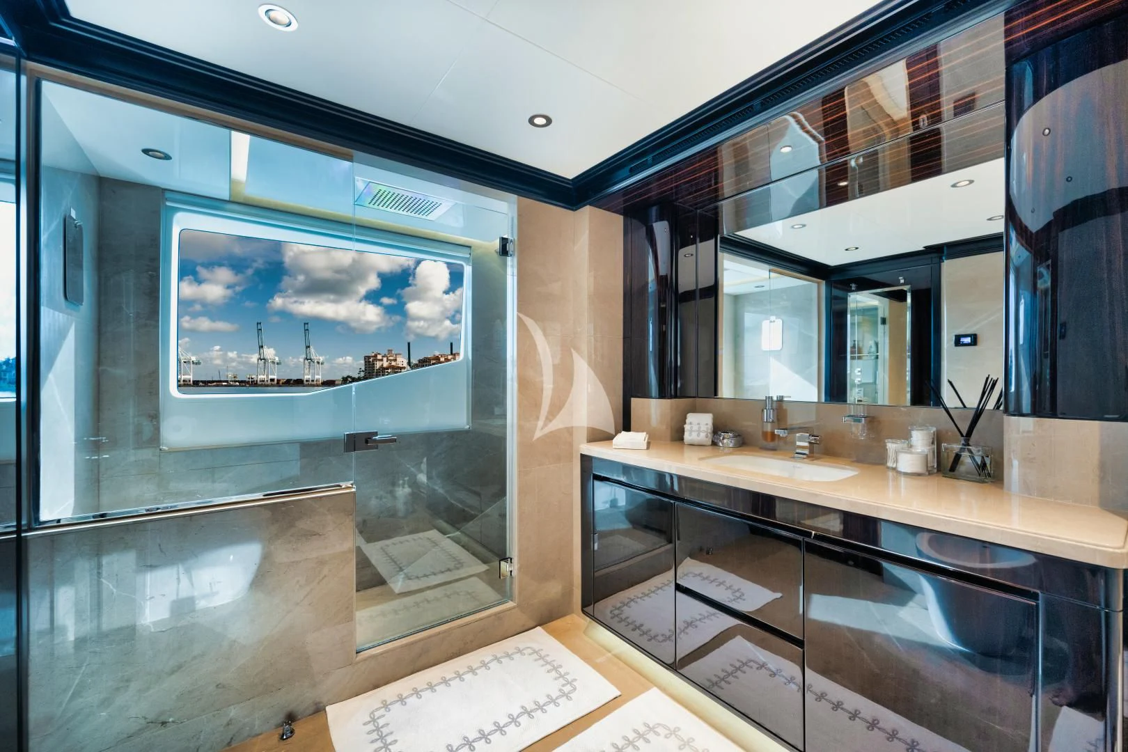 a large screen in a bathroom aboard PERSISTENCE Yacht for Sale