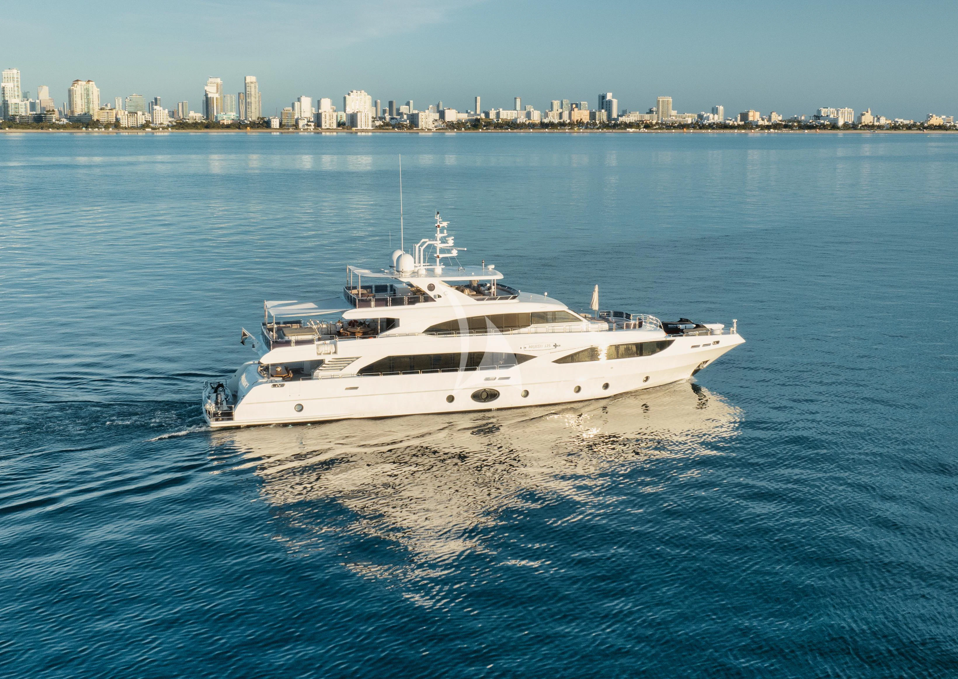 a white yacht on the water aboard PERSISTENCE Yacht for Sale