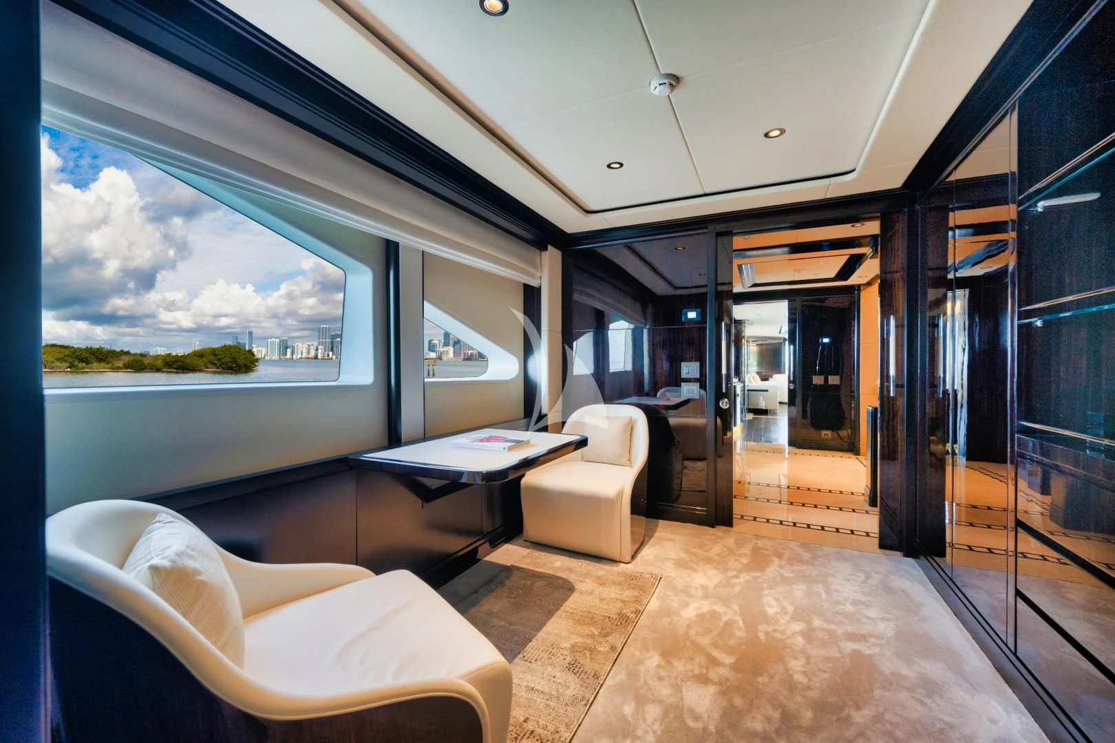 inside of a room with a table and chairs aboard PERSISTENCE Yacht for Sale