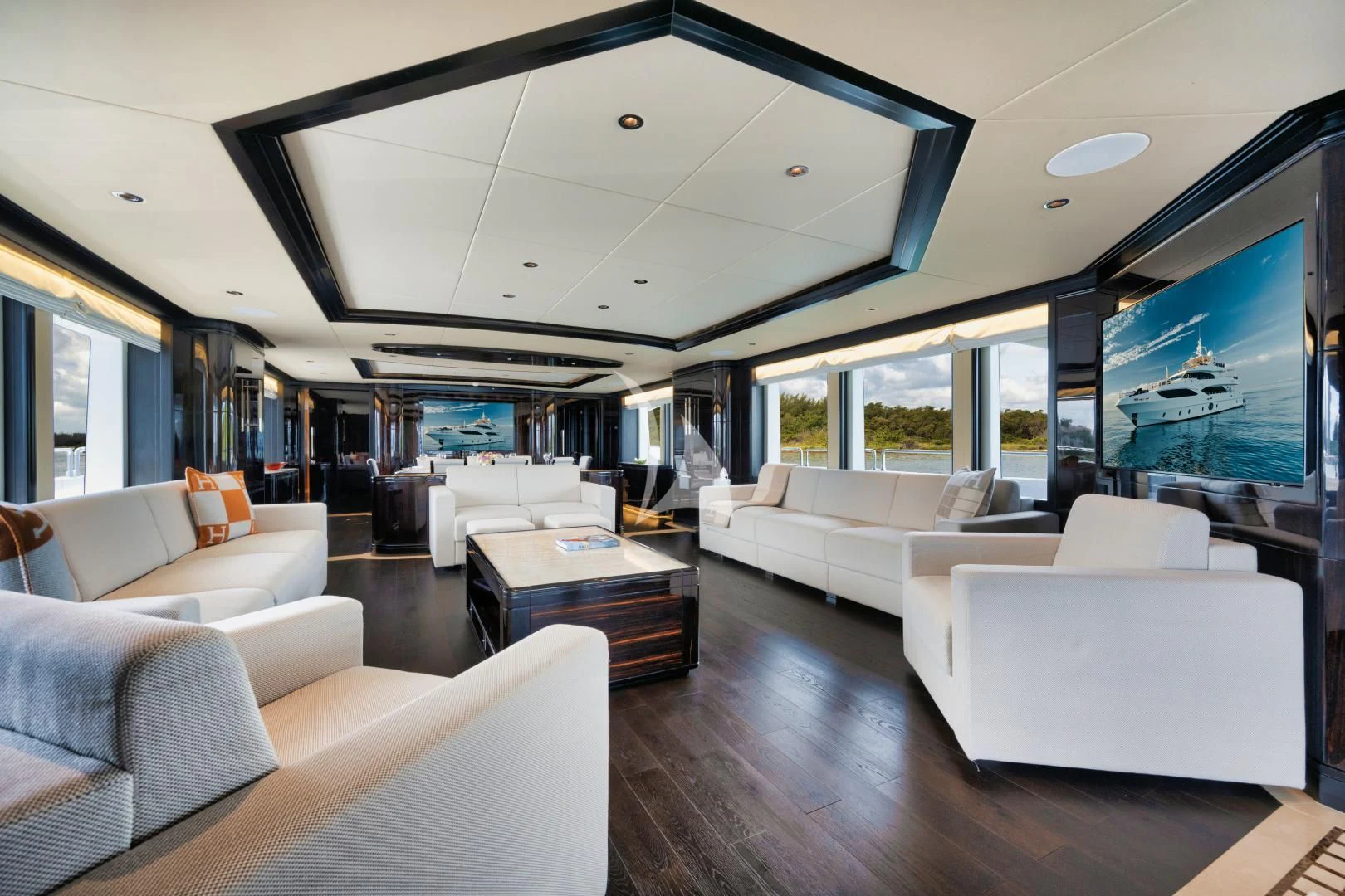 a living room with a large window aboard PERSISTENCE Yacht for Sale