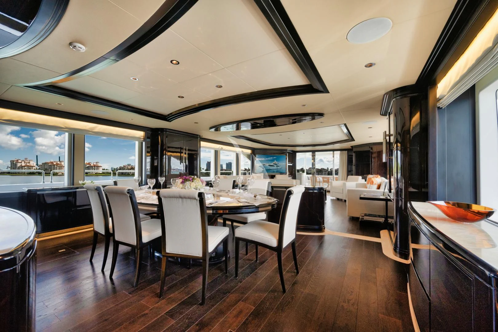 a room with a table and chairs aboard PERSISTENCE Yacht for Sale