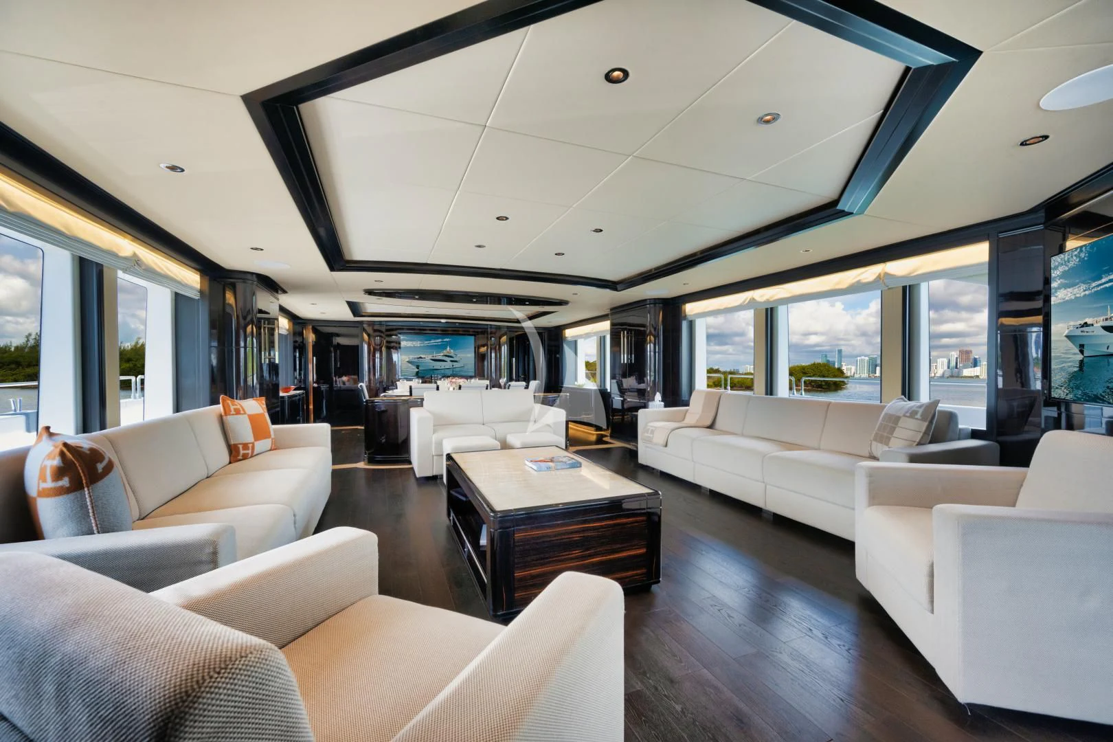 a living room with a large window aboard PERSISTENCE Yacht for Sale