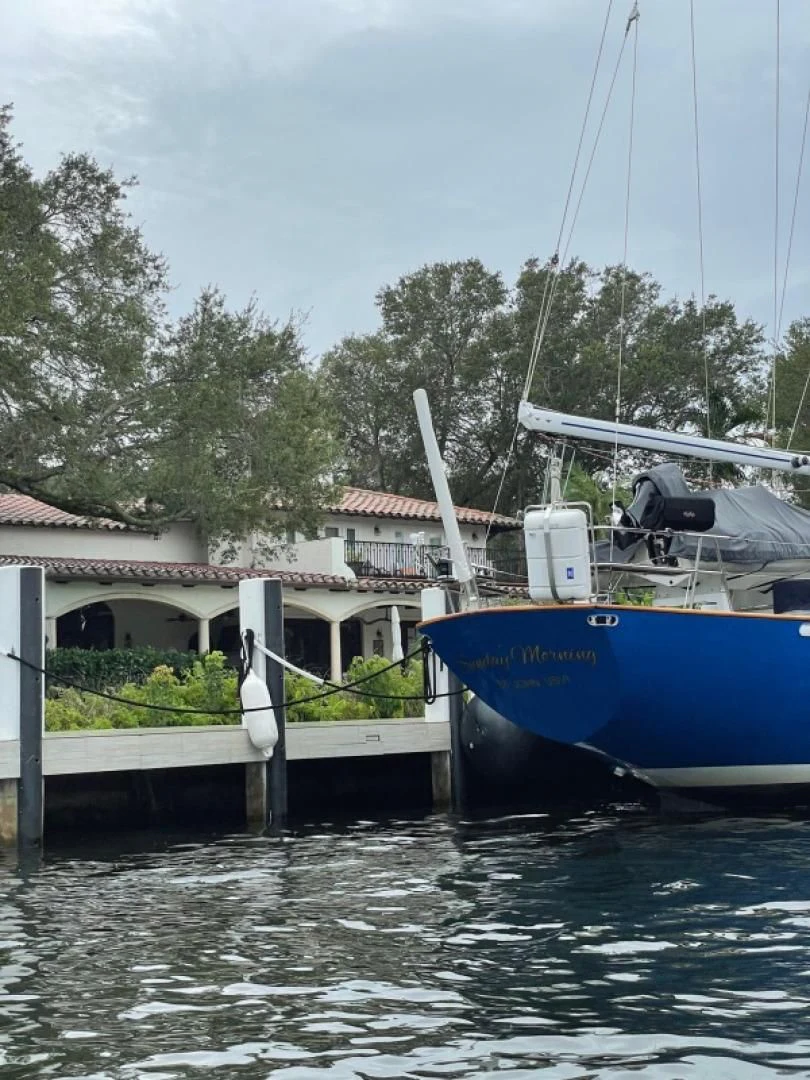a boat docked at a pier aboard SUNDAY MORNING Yacht for Sale