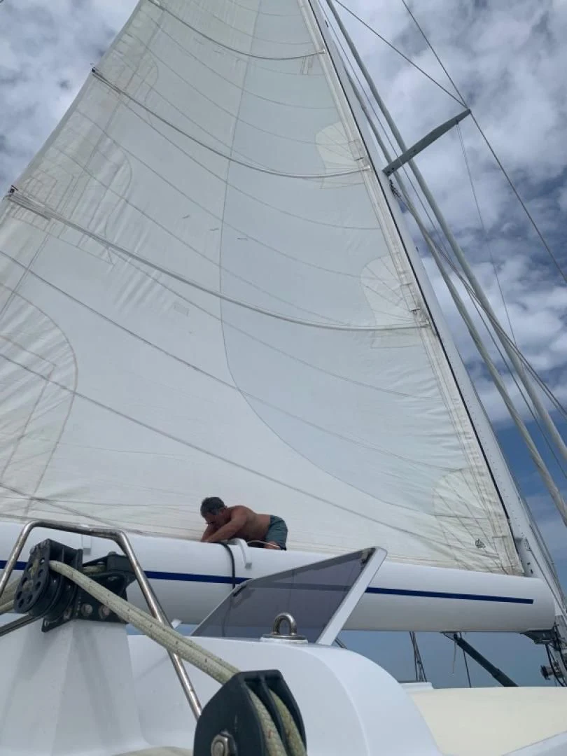 a person on a sailboat aboard SUNDAY MORNING Yacht for Sale