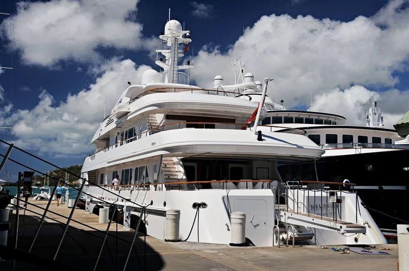 a large white boat aboard AMBITION Yacht for Sale