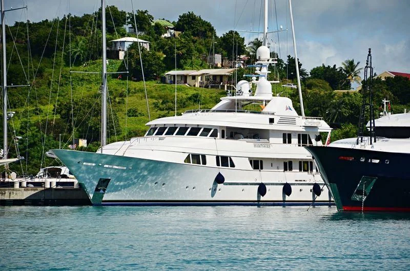 a couple of boats in the water aboard AMBITION Yacht for Sale