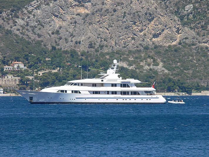a white boat in the water aboard AMBITION Yacht for Sale