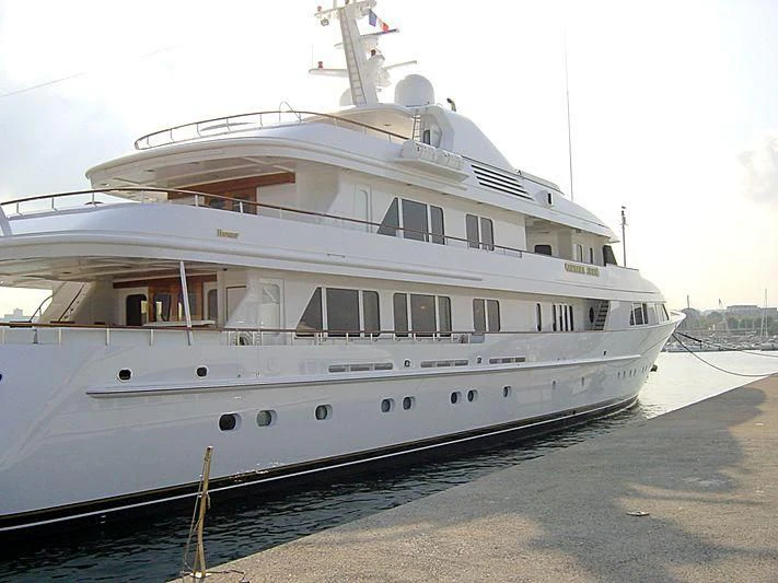a large white boat aboard AMBITION Yacht for Sale