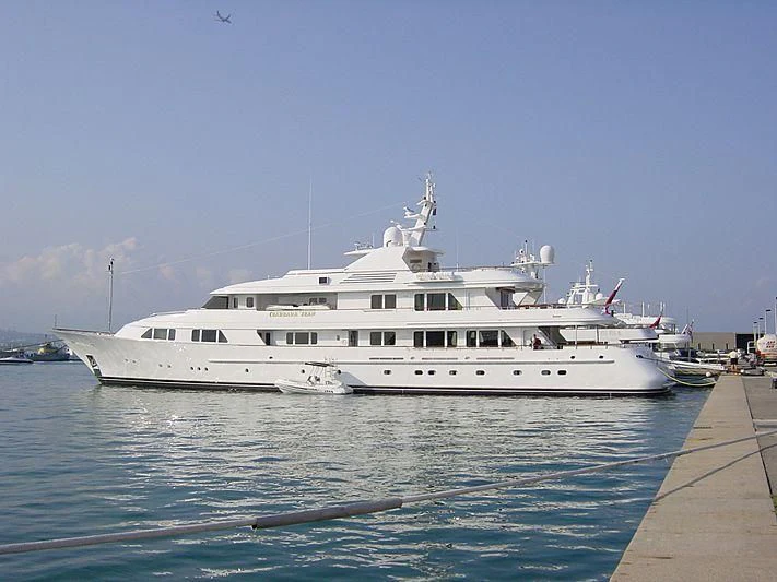a large white boat in the water aboard AMBITION Yacht for Sale