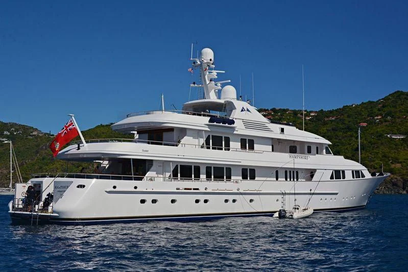 a large white boat aboard AMBITION Yacht for Sale