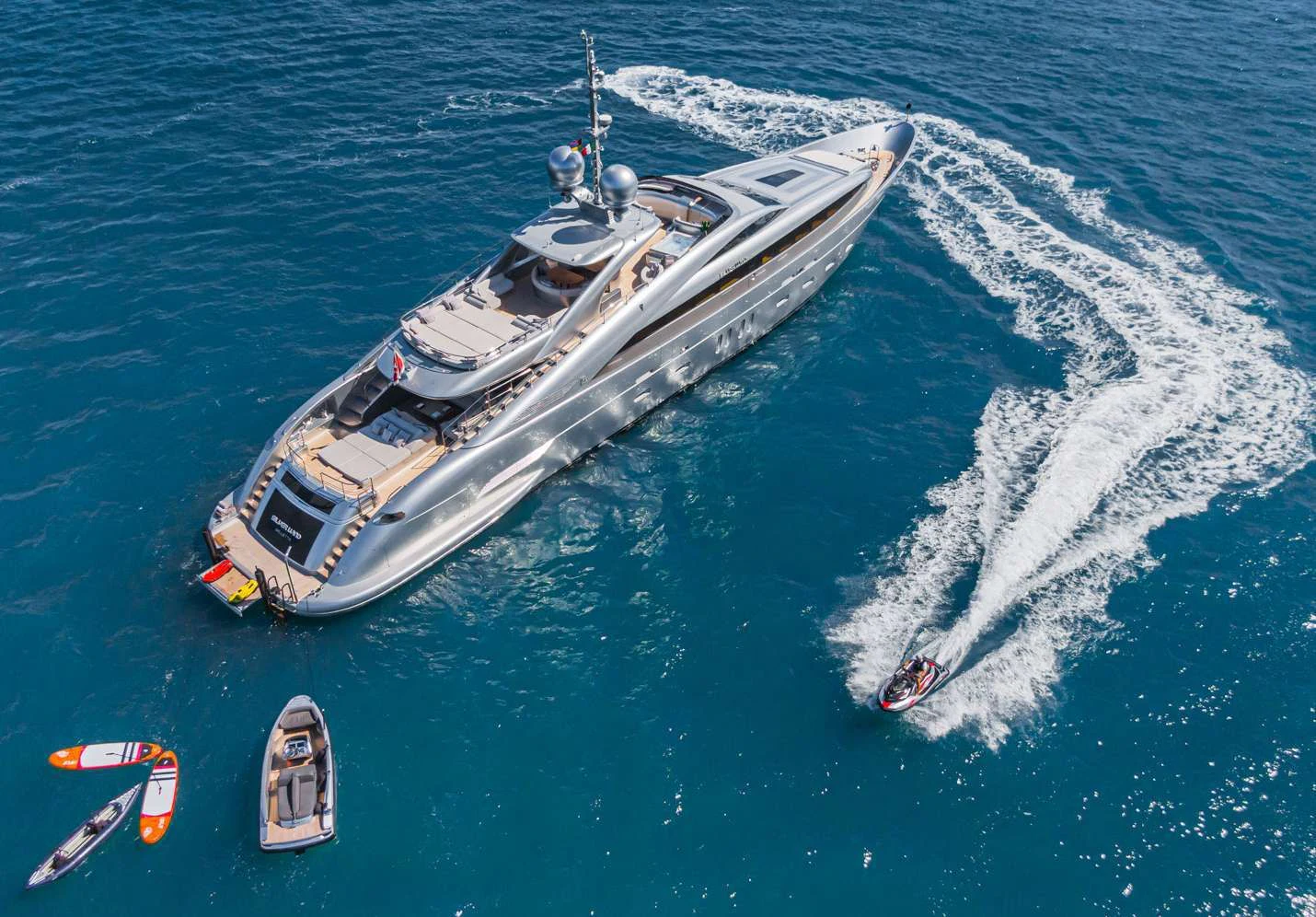 a helicopter flying over a boat aboard SILVER WIND Yacht for Charter