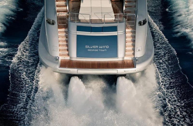 a small white guitar on a white surface aboard SILVER WIND Yacht for Charter