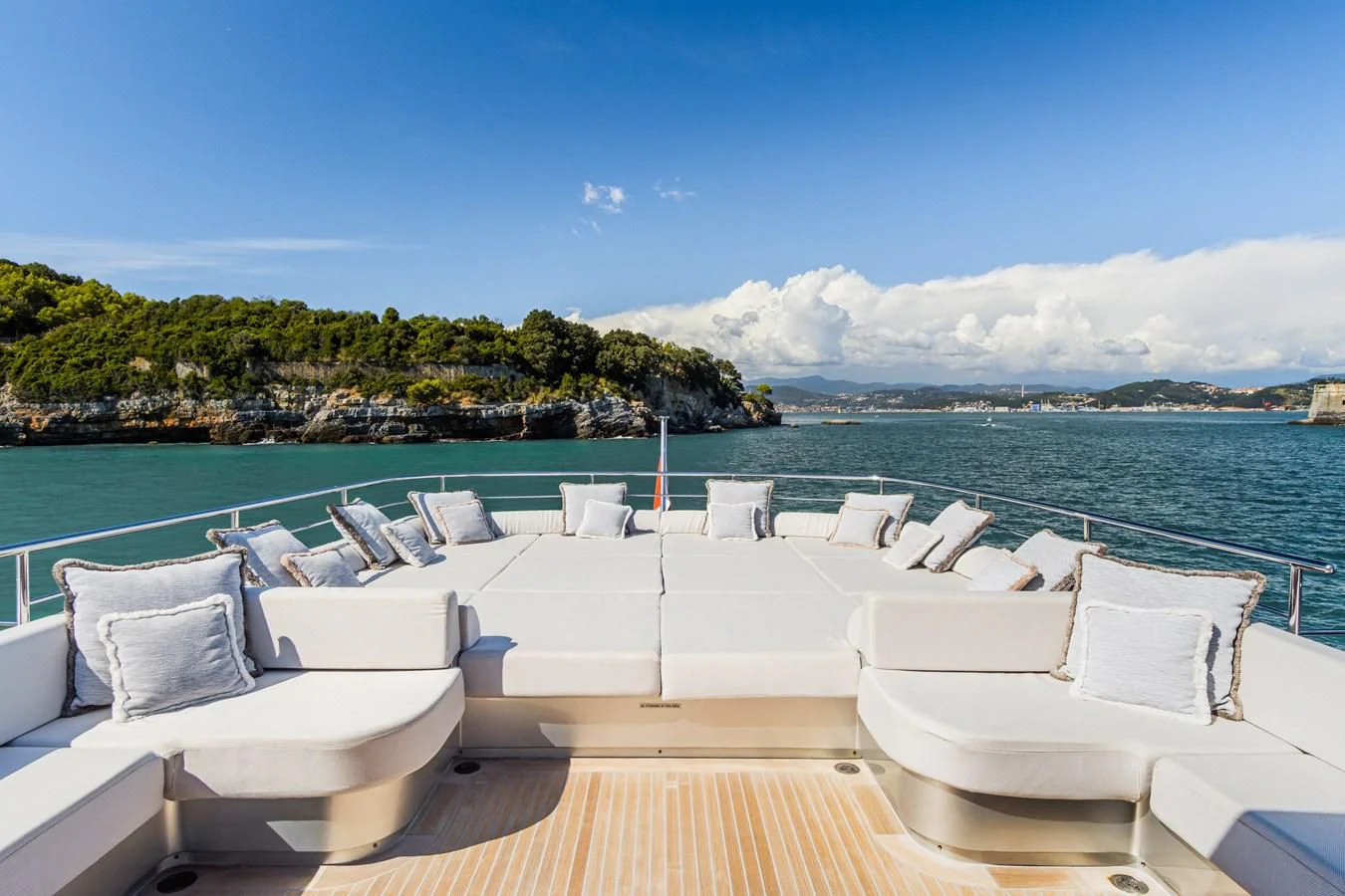 a lounge area with chairs and a body of water in the background aboard SILVER WIND Yacht for Charter