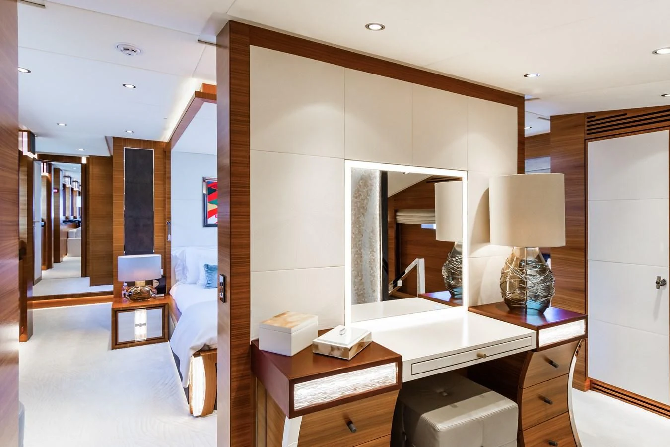 a room with a mirror and a bed aboard SILVER WIND Yacht for Charter
