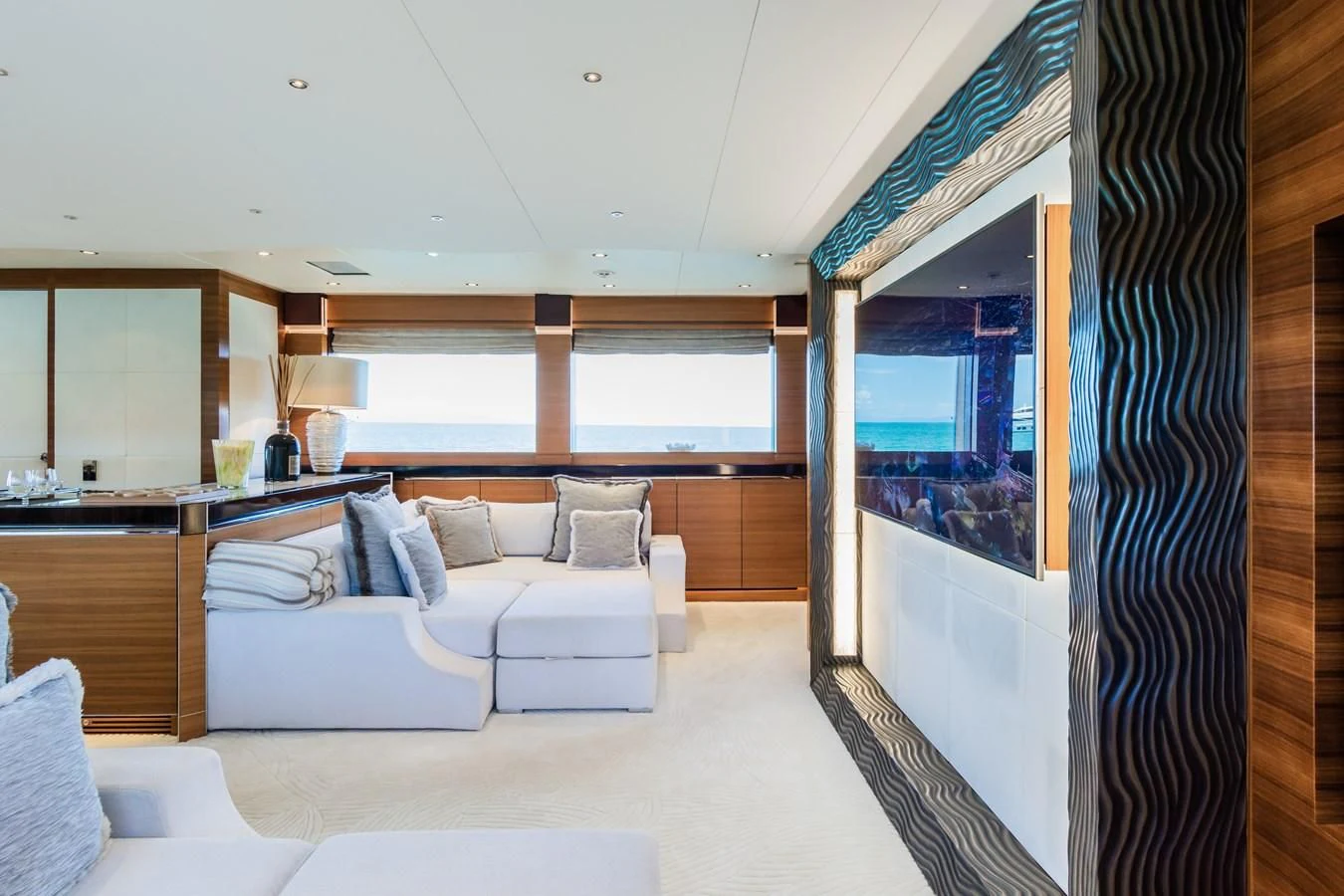 a room with a bed and a couch aboard SILVER WIND Yacht for Charter