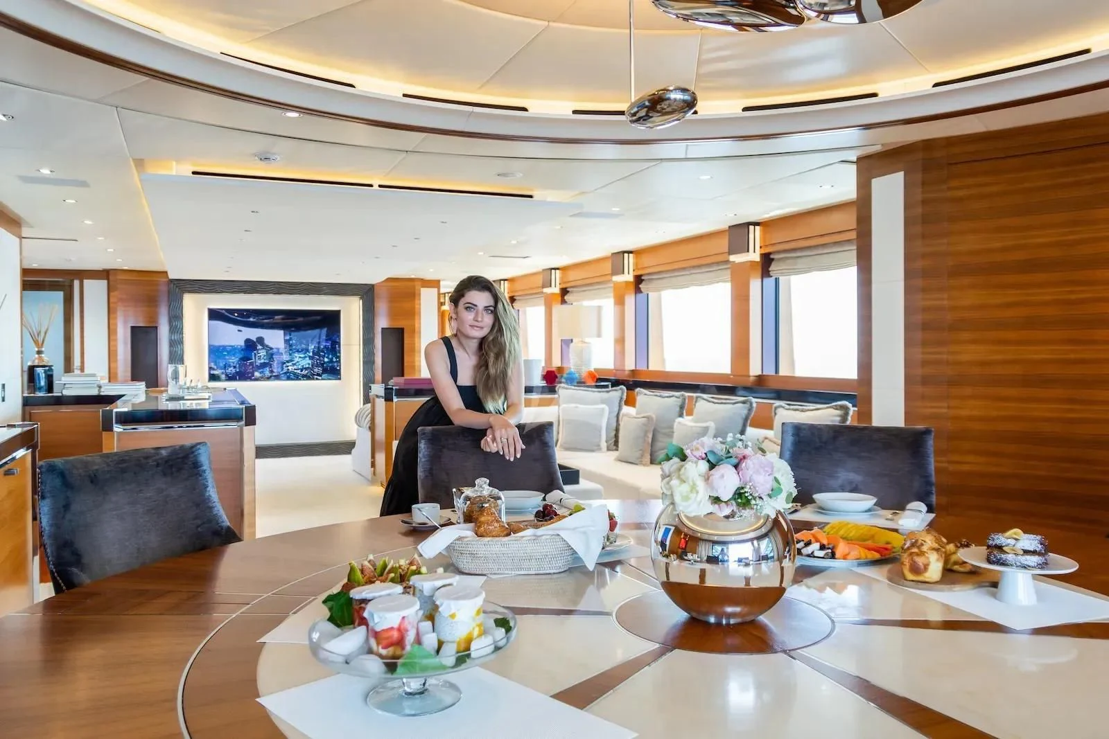 a person sitting at a table aboard SILVER WIND Yacht for Charter