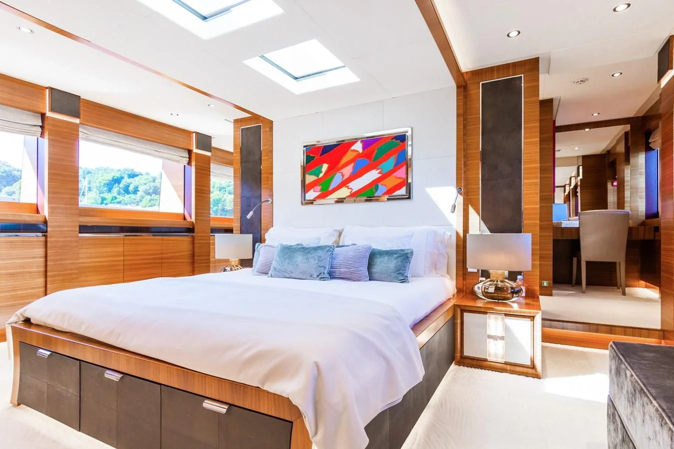 a bedroom with a large bed aboard SILVER WIND Yacht for Charter