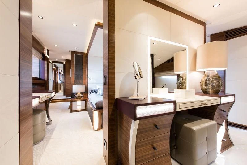 a room with a desk and a bed aboard SILVER WIND Yacht for Charter