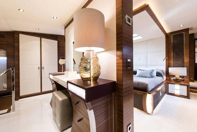 a room with a lamp and a couch aboard SILVER WIND Yacht for Charter