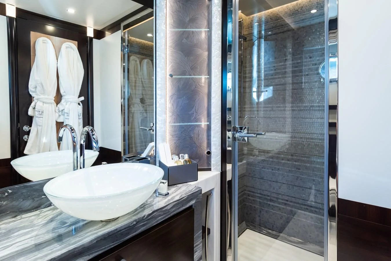 a bathroom with a large mirror aboard SILVER WIND Yacht for Charter