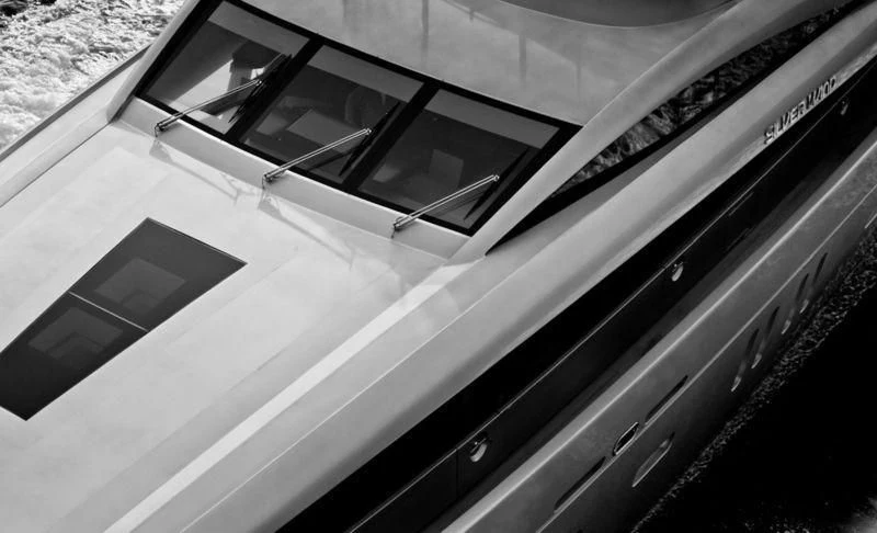 a black and white photo of a car aboard SILVER WIND Yacht for Charter