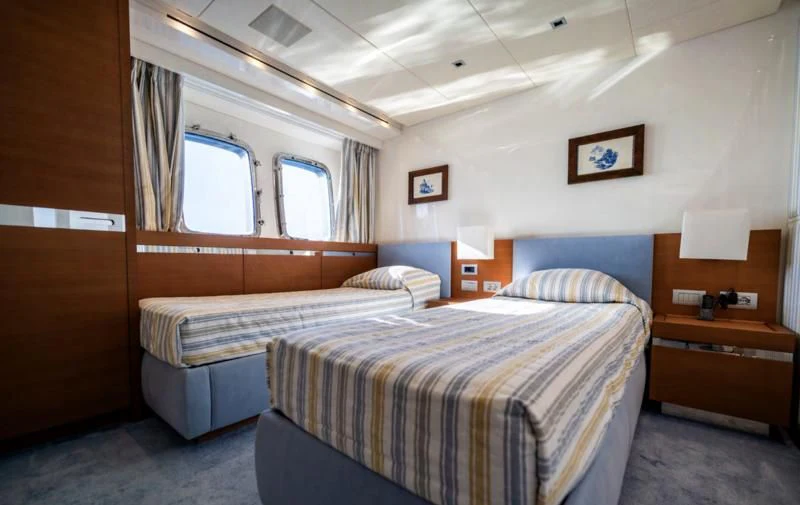 a couple of beds in a room aboard BLUES Yacht for Sale