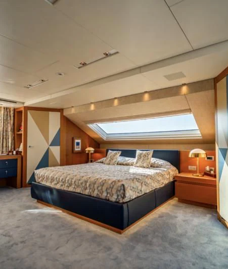 a large bed in a room aboard BLUES Yacht for Sale