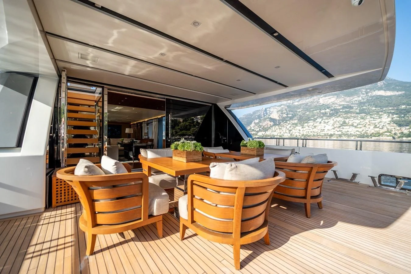 a room with a table and chairs aboard BLUES Yacht for Sale