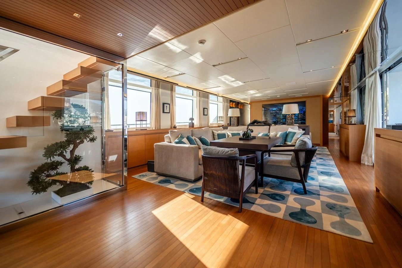 a living room with a wood floor aboard BLUES Yacht for Sale