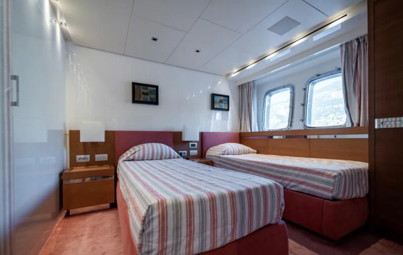 a couple of beds in a room aboard BLUES Yacht for Sale