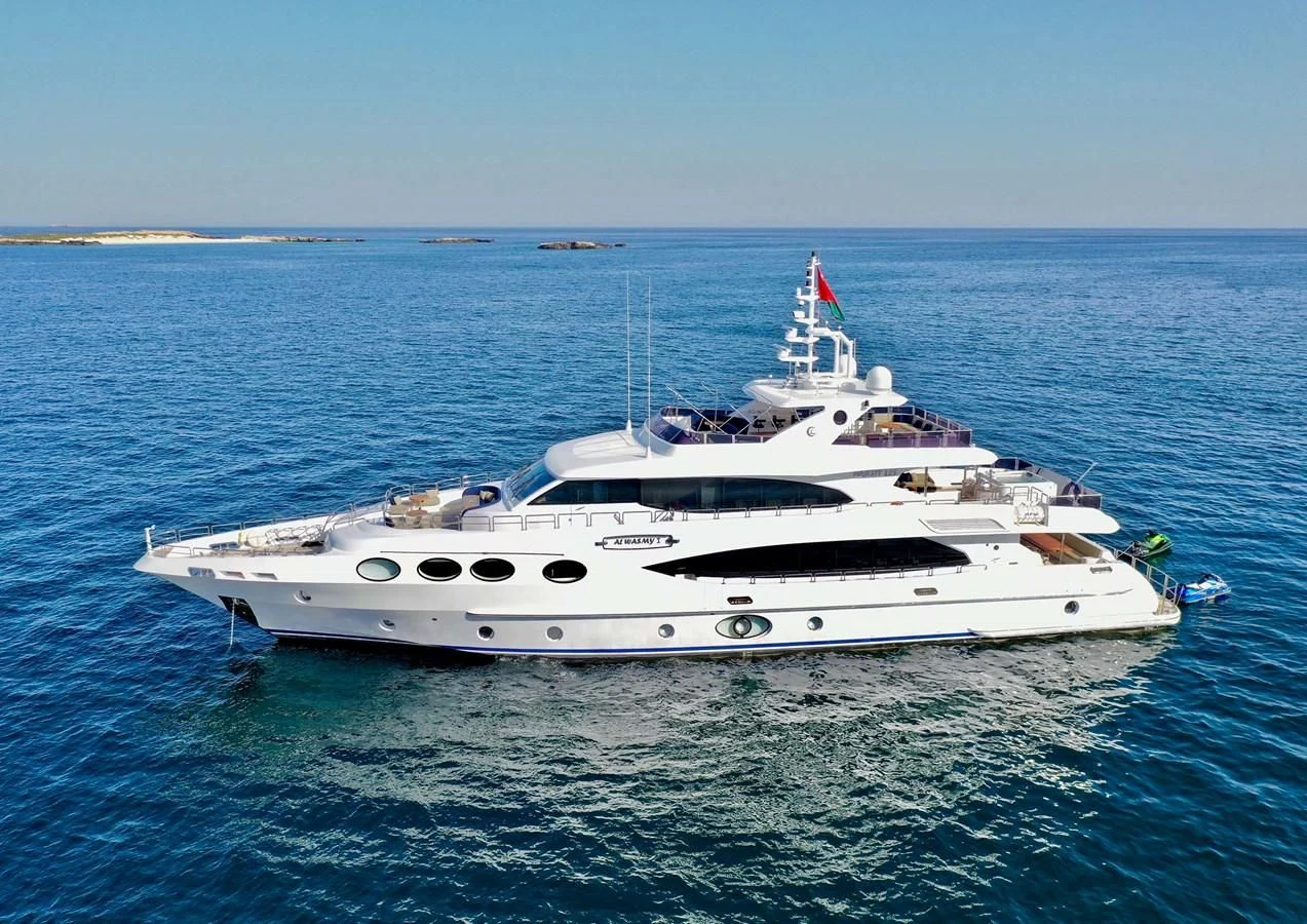 a white yacht in the water aboard AL WASMY I Yacht for Sale