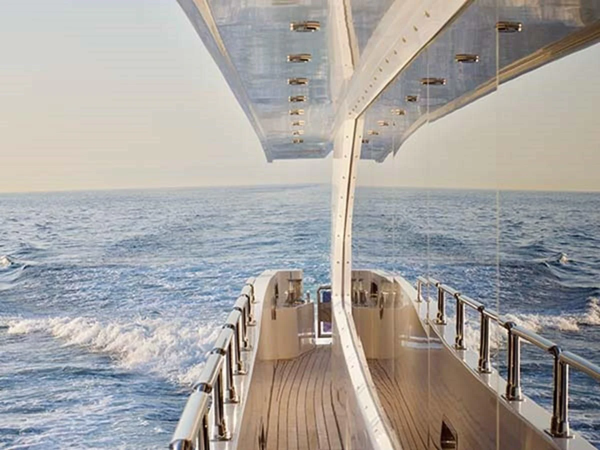 a wooden walkway over water aboard AL WASMY I Yacht for Sale