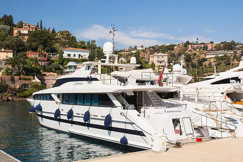 a boat docked at a pier aboard VERSE Yacht for Sale