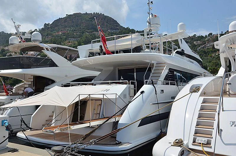 a boat with a ladder on the deck aboard VERSE Yacht for Sale