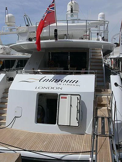 a boat with a flag on the front aboard VERSE Yacht for Sale